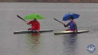 Paddlers with umbrella